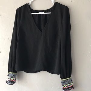 Tobi small black blouse with fun sleeves!